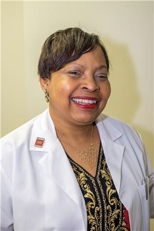 DR. ROXANNE COX-IYAMU