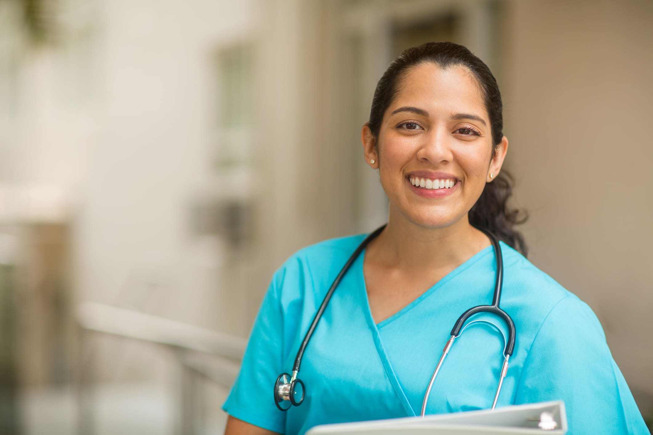 Portrait of young adult female healthcare professional stock photo
