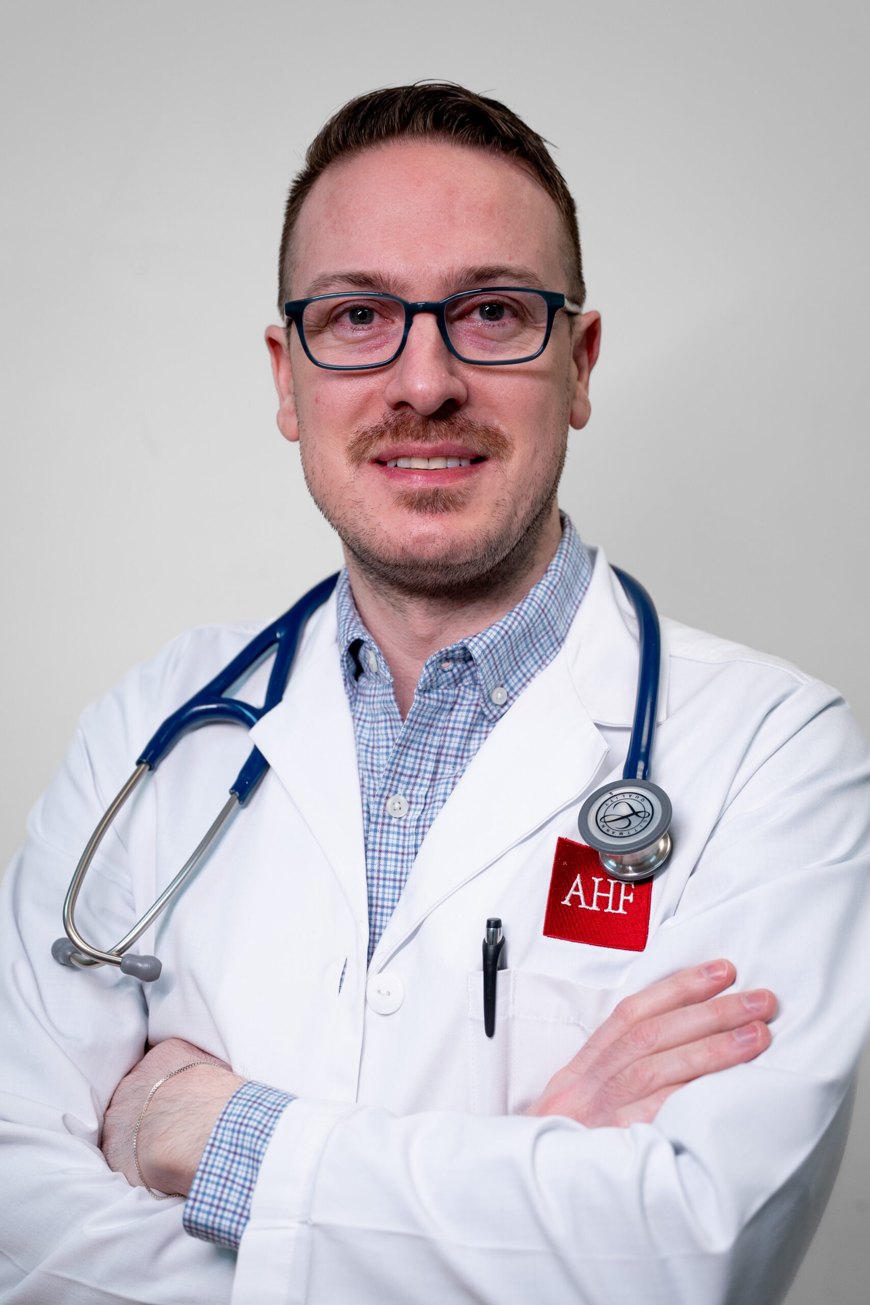 Michael Williams' headshot in the AHF white robe